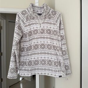 Eddie Bauer fleece sweater half-zip jacket in a tan and cream print. Size M